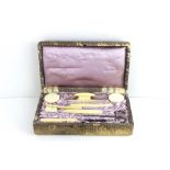 An art deco 1930s snakeskin vanity set complete