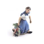 Dahl Jensen Copenhagen porcelain figure of a 'Girl Holding a Basket' Ref 1301