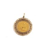 A 1982 1/10th gold Krugerrand, set within yellow metal pendant mount (assessed as gold). (Total