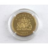 A 1995 Barbados 10 Dollar gold proof coin, purity .583, being to celebrate Queen Elizabeth The Queen