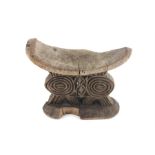 An African tribal carved wood headrest, The Shona, Zimbabwe, late 19th/early 20th century, of