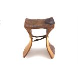 An African tribal carved wood headrest, The Karamajong, Uganda, late 19th/early 20th century,.having