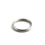 A platinum wedding band, stamped "Platinum", (Approx. 3.2g)