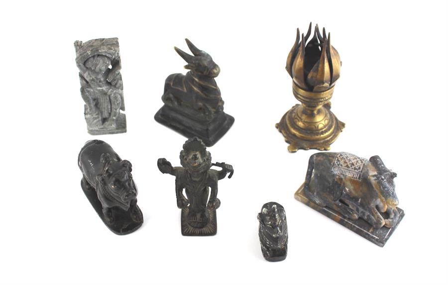  A collection of Indian bronzes including four faced