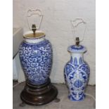 Two large blue and white 20th cent Chinese vases , converted to lamp bases, one with wooden stand.