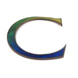 A large  enamelled shopfitting letter C . Height approx 30cm.