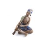 A Dahl Jensen Copenhagen porcelain figure of a 'Boy Snake Charmer'. Ref 1153.