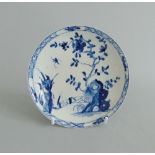 A Worcester blue and white saucer, painted with 'The Warbler' pattern, circa 1754-60,