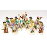 A collection of thirteen Dresden Meissen style Monkey Band figures,