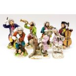 A Meissen style Dresden monkey band of figures, including conductor and six musicians,