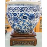 A large 19th Century Chinese blue and white jardiniere, Greek key border,
