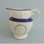 A Staffordshire commemorative feldspathic porcelain jug,