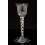 An 18th century opaque and air twist wine glass,