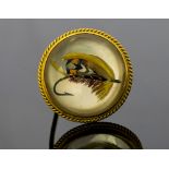 An Edwardian 18ct gold mounted rock crystal brooch, reverse intaglio of a painted fishing fly,