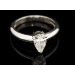 A diamond solitaire platinum ring, the pear shaped brilliant cut diamond weighing approx 0.