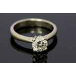A diamond solitaire platinum ring, the round brilliant cut diamond weighing approx 1.