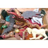 A box containing wooden puppet figures to include Dragons
