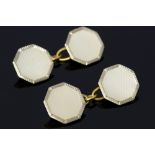 A pair of Art Deco 18ct gold and platinum chain cufflinks, octagonal engine turned decoration,