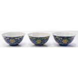 A set of three Chinese blue enamel ground bowls, Guangxi mark, early 20th century,