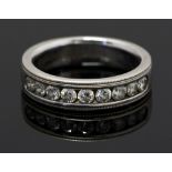 A diamond half eternity, 14ct white gold ring,