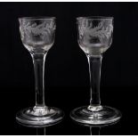 A pair of 18th century wine glasses, circa 1745,