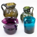 18th century glass vessels including two Nailsea jugs, green with opaque striations and flecks,