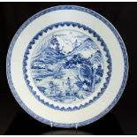 A Chinese blue and white Yongzheng charger, 1723-1735, painted in a bluish tint,