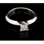 A diamond solitaire platinum ring, claw set with a princess cut diamond, approx weight 0.