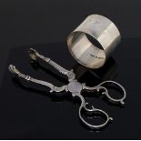 A George III silver sugar tongs with shell bowl,