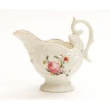 A Chelsea type shell moulded jug, pedestal form with S scroll handle, red rim and floral decoration,