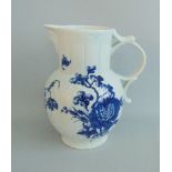 An early Worcester blue and white cabbage leaf moulded masked jug,