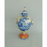 A Staffordshire earthenware vase and cover, yellow ground,
