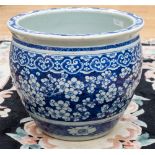 A 19th Century Chinese blue and white jardiniere, decorated with prunus blossom,