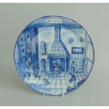 A Dutch Delft 'December ' calendar plate, a winter scene decorated in under glaze blue,