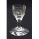 An 18th century cordial glass,