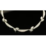 A diamond set 18ct white gold choker necklace, diamond set front section,