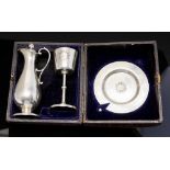 A Victorian silver three-piece travelling communion set consisting of chalice with gilt bowl,