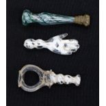 Three 18th century opaque twist glass seals or pipe tampers,