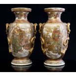 A pair of Japanese Meji period Satsuma ware vases, gilt moulded ring and knotted rope handles,