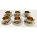 A set of six Royal Worcester coffee cans and saucers, all signed Telford, wild birds,