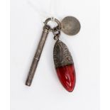 A Victorian miniature scent bottle with silver top unmarked with cranberry glass,