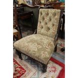 A Victorian mahogany gentleman's armchair and a matching lady's chair