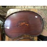 An Edwardian mahogany and inlay kidney shaped tea tray