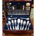 A wood cased canteen of Viners silver plated Kings pattern cutlery,