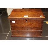 A 19th Century oak box, containing smoking related items, carvings, etc,