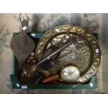 An Arabian brass wall plaque, a 1930s companion set, Petit Point clock, bellows,