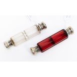 A Cranberry glass double end perfume bottle with silver ringed caps;