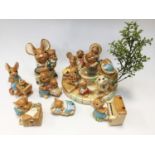 Pendelfin stand (band stand) and fifteen figurines including a large Rabbit (17)