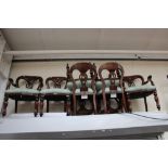 A set of seven Victorian dining chairs,