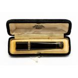 An Art Deco cheroot holder with geometric band set rose cut diamonds a/f,